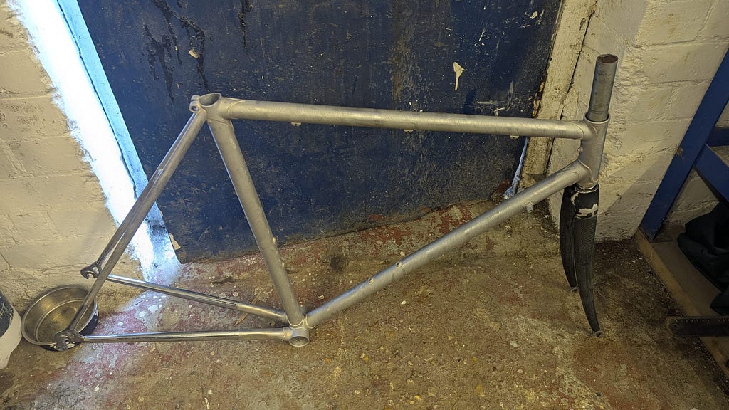 Bare frame prepared for inspection and paint